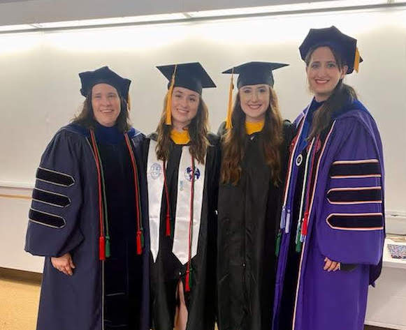 Left to Right: Dr. Cassie Majetic, Valerie Eddington, Hannah Nichols, and Dr. Vanessa Young.  All in academic regalia. 